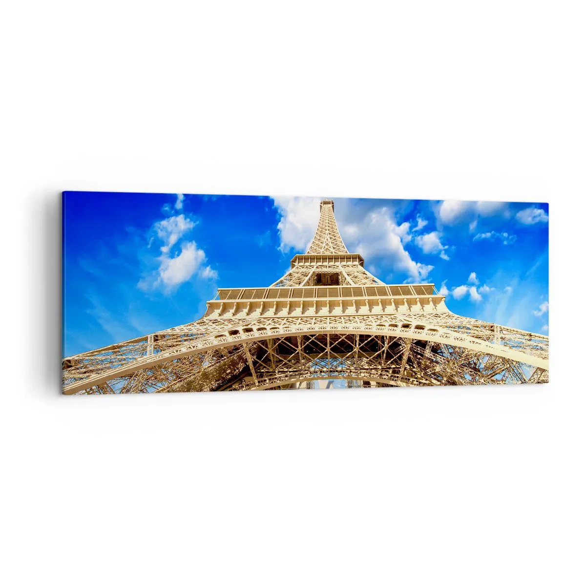 Bild auf Leinwand - Leinwandbild - Der Eiffelturm von unten vor blauem Himmel - 140x50cm - In den Himmel und in die Wolken gehen - Moderne Wanddekoration für Wohnzimmer und Schlafzimmer ARTTOR