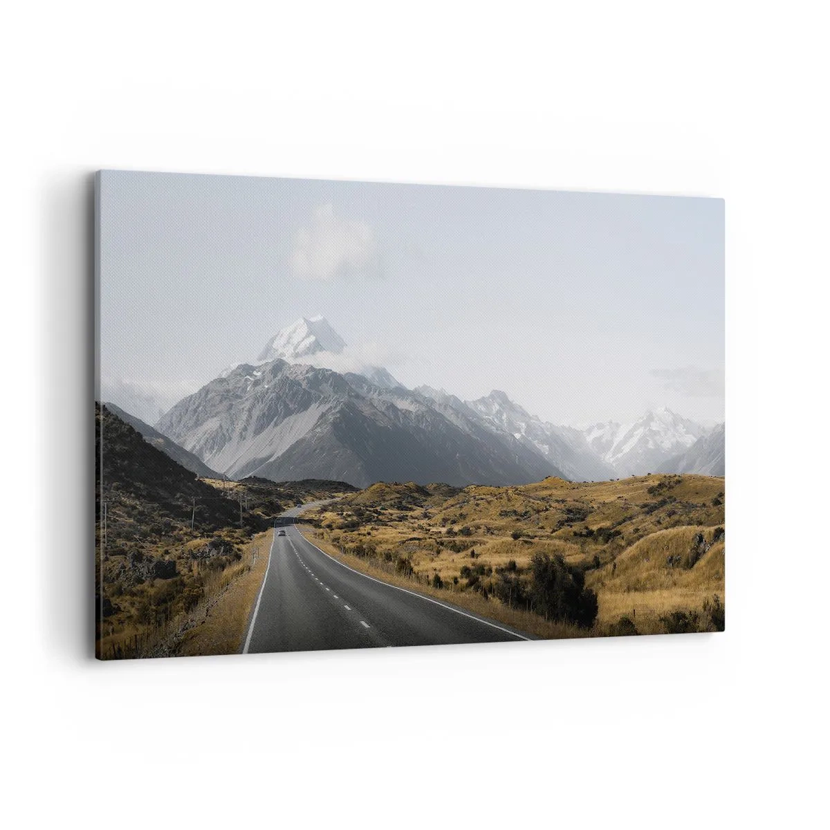 Bild auf Leinwand - Leinwandbild - Eine Straße in den Bergen, umgeben von einer malerischen Landschaft - 100x70cm - Der Weg ins Herz der Berge - Moderne Wanddekoration für Wohnzimmer und Schlafzimmer ARTTOR