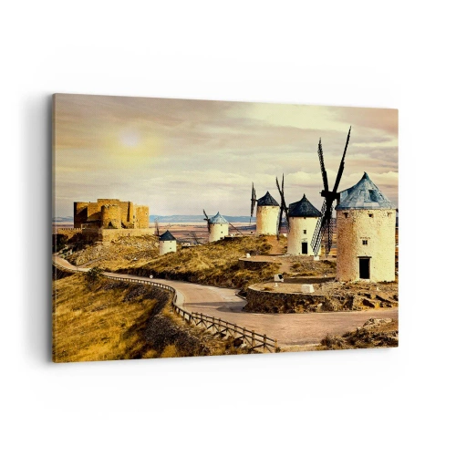 Bild auf Leinwand - Leinwandbild - Windmühlen auf den Hügeln mit einer historischen Burg im Hintergrund - 100x70cm - Don Quijote kommt gleich - Moderne Wanddekoration für Wohnzimmer und Schlafzimmer ARTTOR
