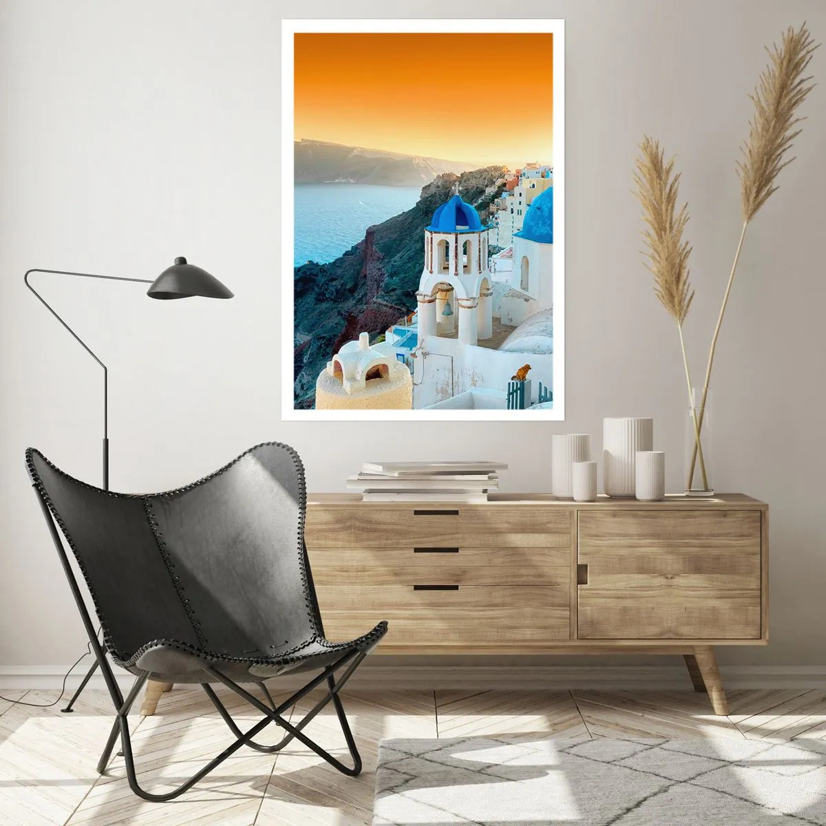 Poster - Santorini - an die Felsen gekuschelt - 70x100 cm