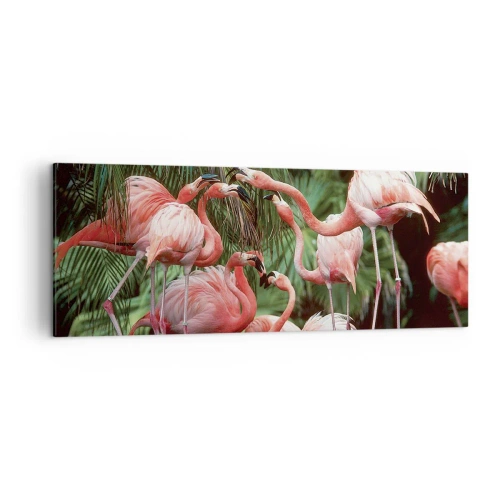 Bild auf Leinwand - Leinwandbild - Eine Gruppe von Flamingos in einer tropischen Umgebung, umgeben von Palmen - 140x50cm - Nachmittagsklatsch - Moderne Wanddekoration für Wohnzimmer und Schlafzimmer ARTTOR