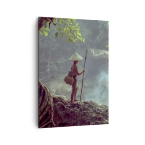 Bild auf Leinwand - Leinwandbild - Eine Figur mit einem Speer an einem Wasserfall in einem tropischen Wald - 50x70cm - Befreundet mit der Natur - Moderne Wanddekoration für Wohnzimmer und Schlafzimmer ARTTOR