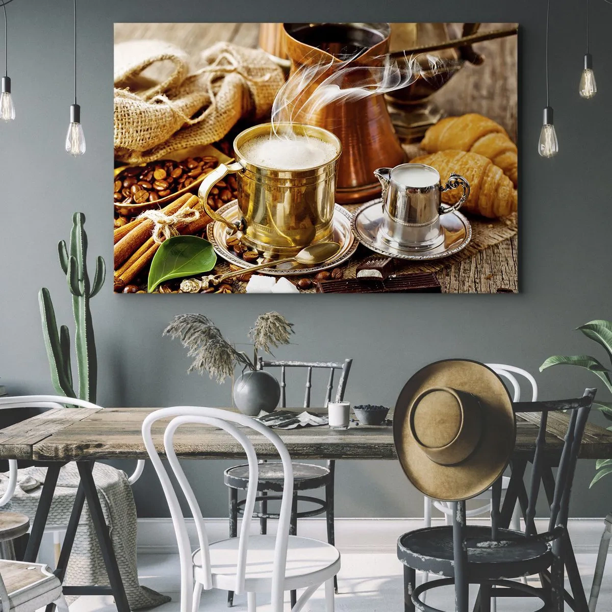 Bild auf Leinwand - Leinwandbild - Eine goldene Tasse Kaffee, umgeben von Bohnen, Krügen und Croissants - 100x70cm - Schönen Tag noch! - Moderne Wanddekoration für Wohnzimmer und Schlafzimmer ARTTOR