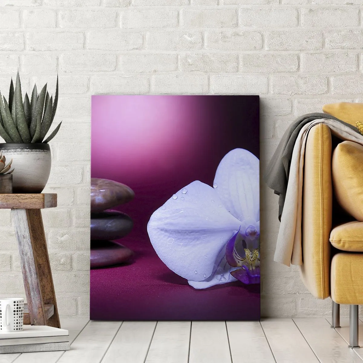 Bild auf Leinwand - Leinwandbild - Weiße Orchidee und Steine auf rosa Hintergrund - 80x120cm - Eine Studie der Frische in Lila - Moderne Wanddekoration für Wohnzimmer und Schlafzimmer ARTTOR