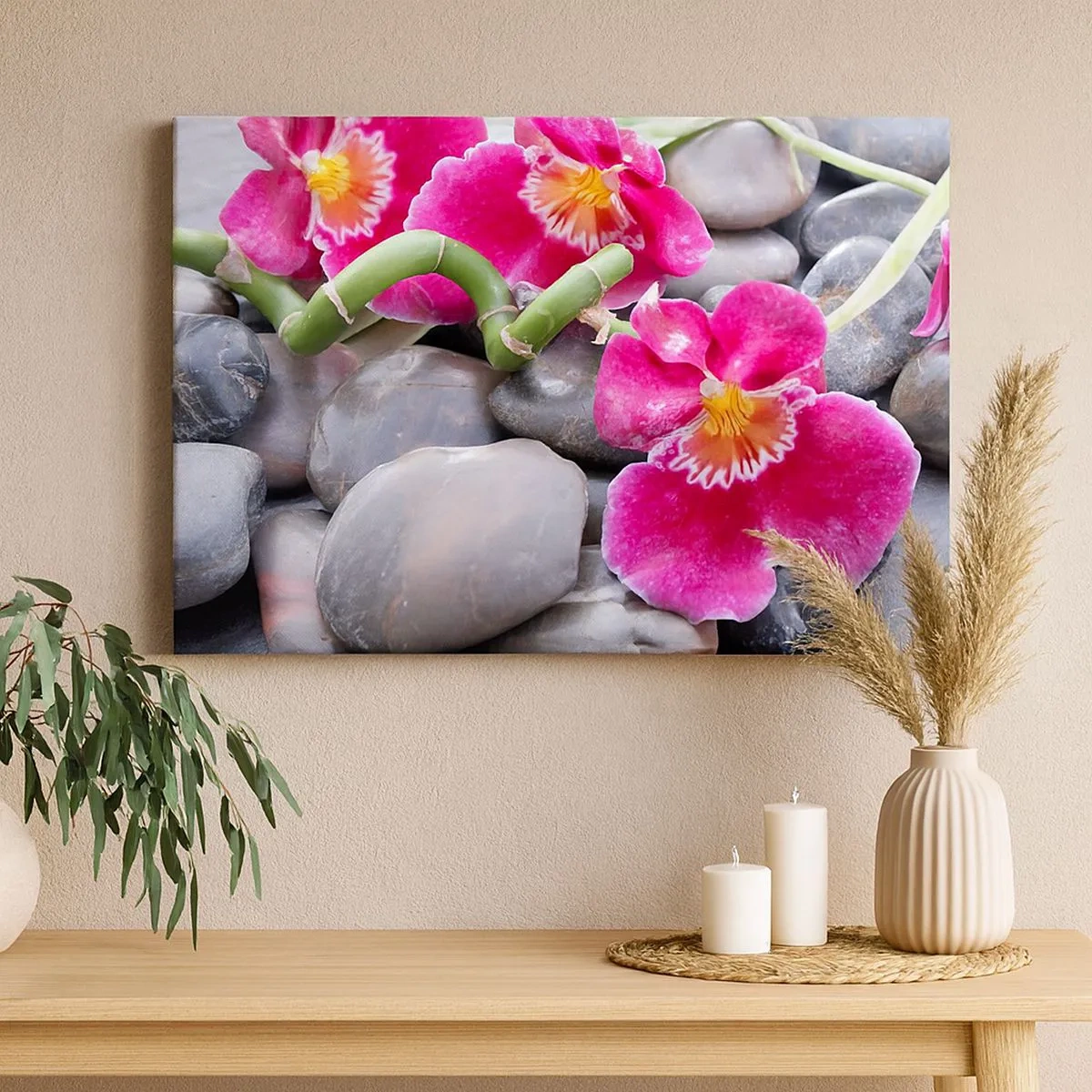 Bild auf Leinwand - Leinwandbild - Rosa Orchideen vor einem Hintergrund aus glatten Steinen - 70x50cm - Kühlen und erhitzen - Moderne Wanddekoration für Wohnzimmer und Schlafzimmer ARTTOR