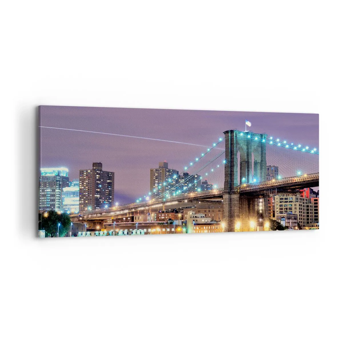Bild auf Leinwand - Leinwandbild - Brooklyn Bridge bei Nacht mit der beleuchteten Stadt im Hintergrund - 120x50cm - Seit vielen Jahren die Brooklyn Bridge - Moderne Wanddekoration für Wohnzimmer und Schlafzimmer ARTTOR