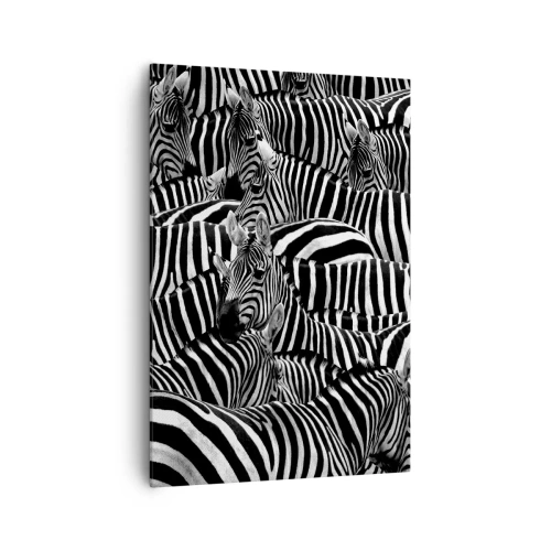 Bild auf Leinwand - Leinwandbild - Eine Gruppe Zebras mit schwarzen und weißen Streifen, die ein symmetrisches Muster bilden. - 70x100cm - Gestreiftes Gruppenportrait - Moderne Wanddekoration für Wohnzimmer und Schlafzimmer ARTTOR