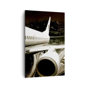 Bild auf Leinwand - Leinwandbild - Ein Flugzeug über einer nächtlichen Stadt mit beleuchteten Autobahnen - 80x120cm - In die Nacht fliegen - Moderne Wanddekoration für Wohnzimmer und Schlafzimmer ARTTOR
