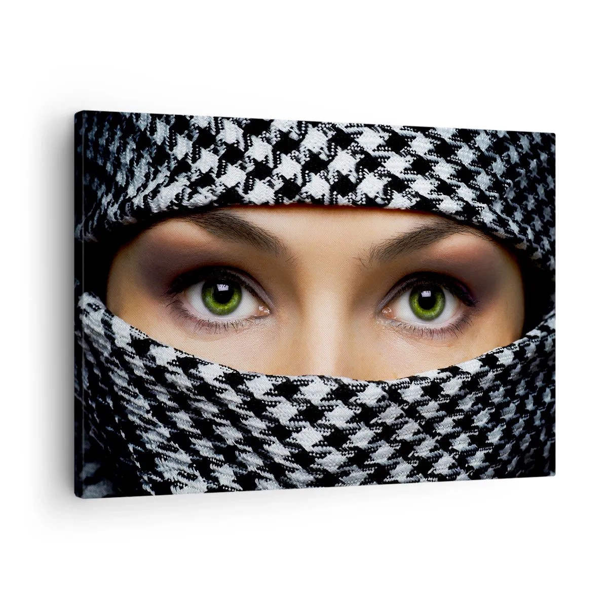 Bild auf Leinwand - Leinwandbild - Hinter einem schwarz-weiß gemusterten Stoff verbergen sich die grünen Augen einer Frau. - 70x50cm - Ein Porträt einer verschleierten grünäugigen Schönheit - Moderne Wanddekoration ARTTOR
