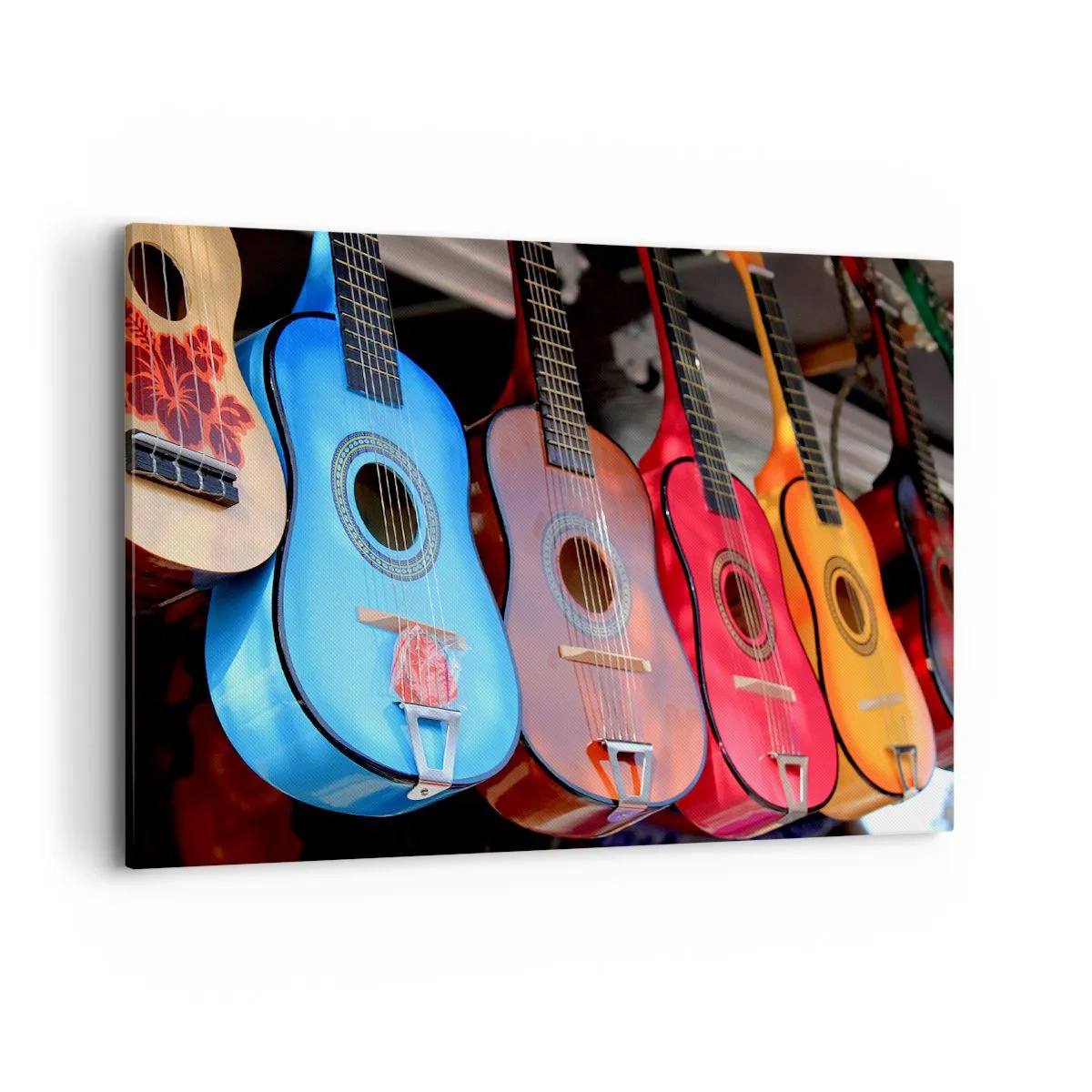 Bild auf Leinwand - Leinwandbild - Bunte Akustikgitarren hängen in einer Reihe auf dem Display - 100x70cm - Lateinische Atmosphäre - Moderne Wanddekoration für Wohnzimmer und Schlafzimmer ARTTOR
