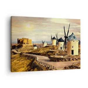 Bild auf Leinwand - Leinwandbild - Windmühlen auf den Hügeln mit einer historischen Burg im Hintergrund - 70x50cm - Don Quijote kommt gleich - Moderne Wanddekoration für Wohnzimmer und Schlafzimmer ARTTOR