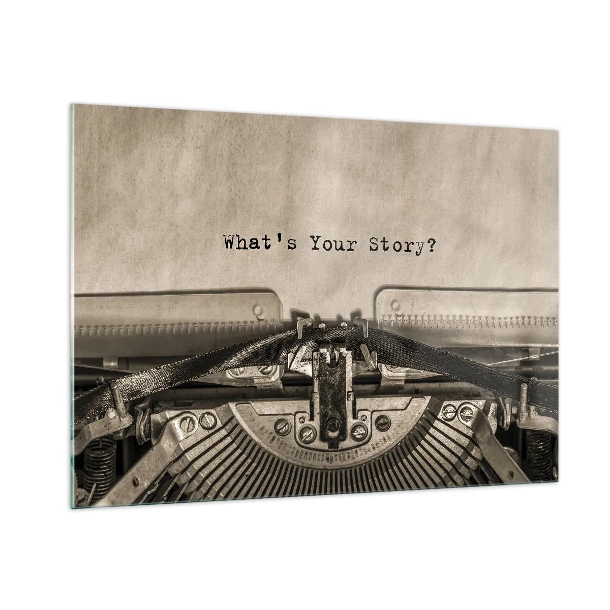 Glasbild - Bild auf glas - Nahaufnahme einer Schreibmaschine mit dem Text „Was ist Ihre Geschichte?“ - 100x70cm - Erzähl es mir - Moderne Wanddekoration für Wohnzimmer und Schlafzimmer ARTTOR