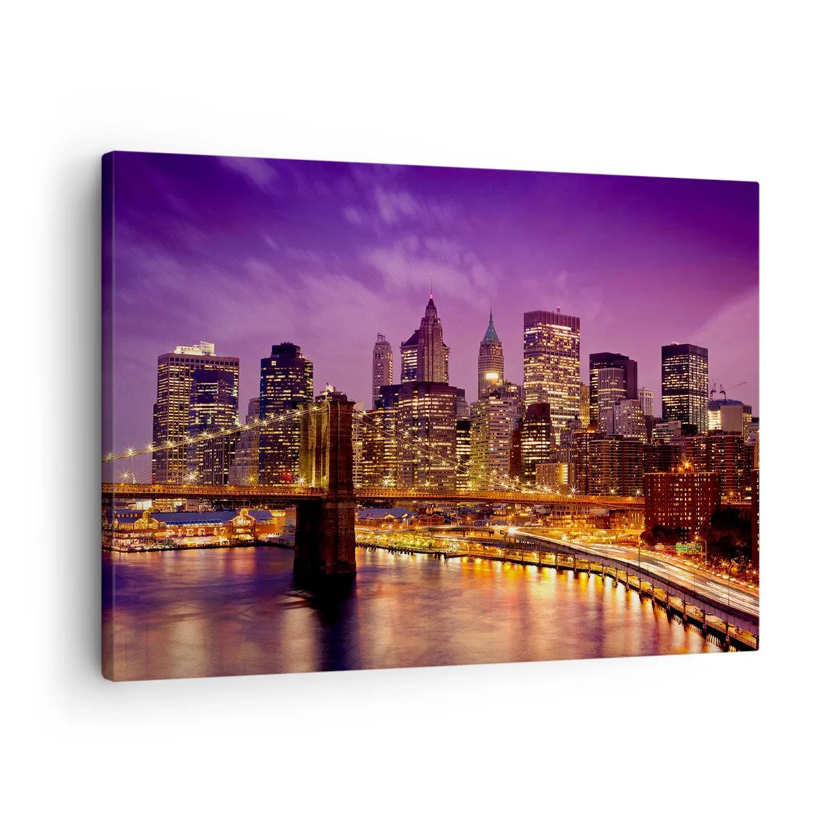 Bild auf Leinwand - Leinwandbild - Panorama der Stadt mit der Brücke im Abendlicht vor dem violetten Himmel - 70x50cm - Violett-goldenes Manhathann - Moderne Wanddekoration für Wohnzimmer und Schlafzimmer ARTTOR
