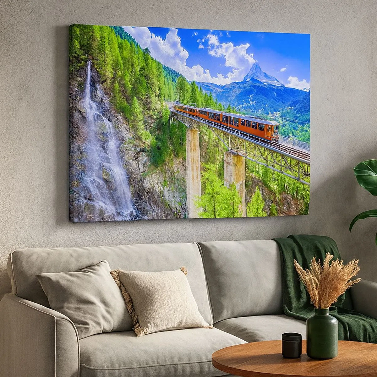 Bild auf Leinwand - Leinwandbild - Eine Achterbahn auf einer Brücke mit Blick auf einen Wasserfall und Berge - 70x50cm - Jetzt sind Alpen dran - Moderne Wanddekoration für Wohnzimmer und Schlafzimmer ARTTOR