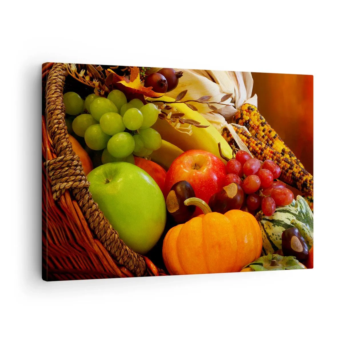 Bild auf Leinwand - Leinwandbild - Ein Korb mit Obst, Kürbissen und Mais vor einem Hintergrund aus Herbstfarben. - 70x50cm - Ein Korb voller Ernte - Moderne Wanddekoration für Wohnzimmer und Schlafzimmer ARTTOR