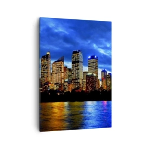 Bild auf Leinwand - Leinwandbild - Panorama der nächtlichen Stadt mit beleuchteten Wolkenkratzern über dem Wasser - 50x70cm - Eine Nacht der Lichter und Farben - Moderne Wanddekoration für Wohnzimmer und Schlafzimmer ARTTOR