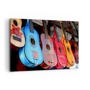Bild auf Leinwand - Leinwandbild - Bunte Akustikgitarren hängen in einer Reihe auf dem Display - 120x80cm - Lateinische Atmosphäre - Moderne Wanddekoration für Wohnzimmer und Schlafzimmer ARTTOR