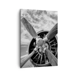 Bild auf Leinwand - Leinwandbild - Ein Schwarzweißfoto eines Flugzeugpropellers vor einem dynamischen Himmel. - 50x70cm - Eroberer der Lüfte - Moderne Wanddekoration für Wohnzimmer und Schlafzimmer ARTTOR