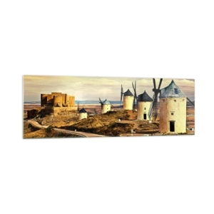 Glasbild - Bild auf glas - Windmühlen auf den Hügeln mit einer historischen Burg im Hintergrund - 160x50cm - Don Quijote kommt gleich - Moderne Wanddekoration für Wohnzimmer und Schlafzimmer ARTTOR