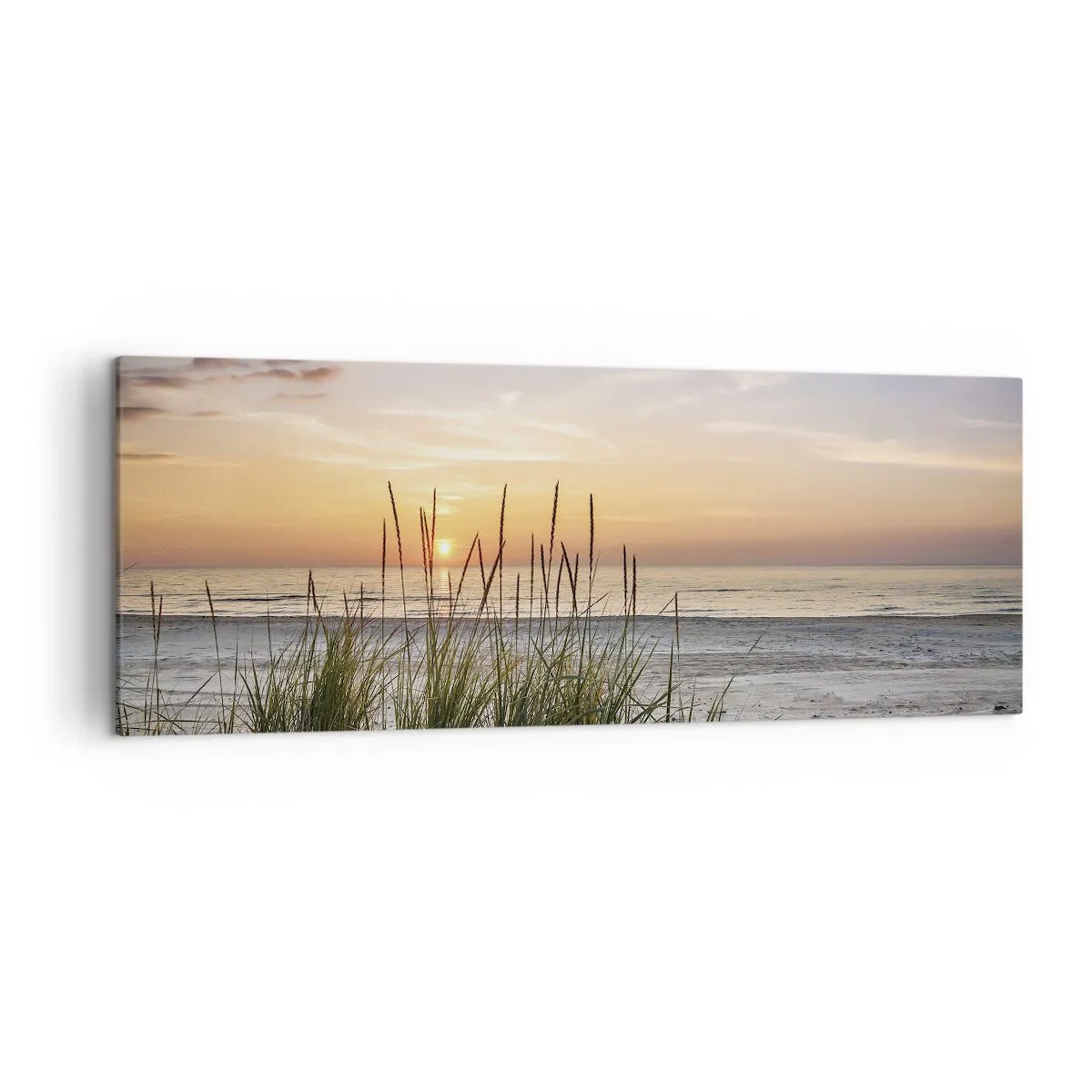 Bild auf Leinwand - Leinwandbild - Ein Sandstrand bei Sonnenuntergang mit Gras im Hintergrund - 140x50cm - Schau, denk, fühl - Moderne Wanddekoration für Wohnzimmer und Schlafzimmer ARTTOR