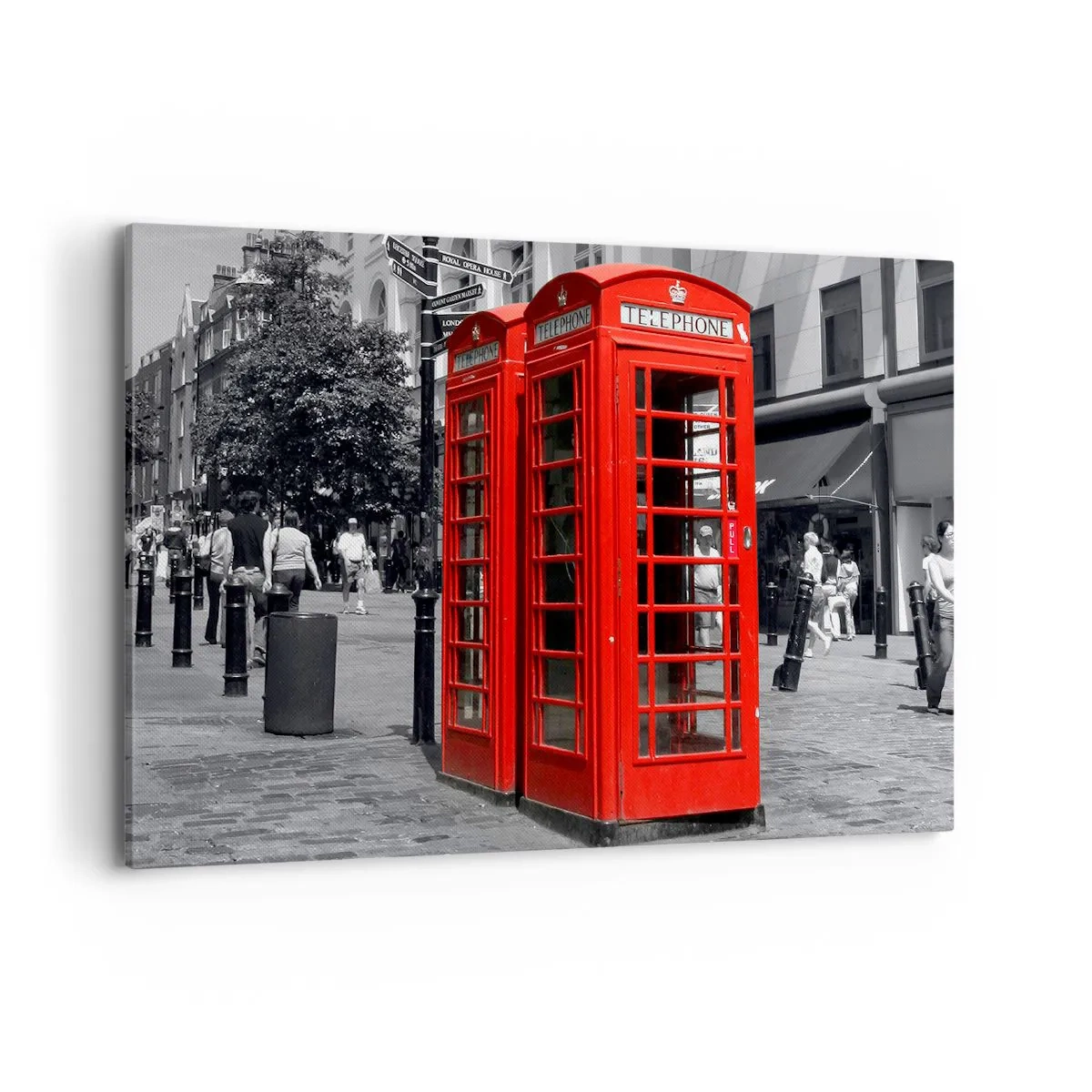 Bild auf Leinwand - Leinwandbild - Rote Telefonzellen vor einer schwarz-weißen Stadtkulisse. - 100x70cm - Rote Telefonzellen - Moderne Wanddekoration für Wohnzimmer und Schlafzimmer ARTTOR