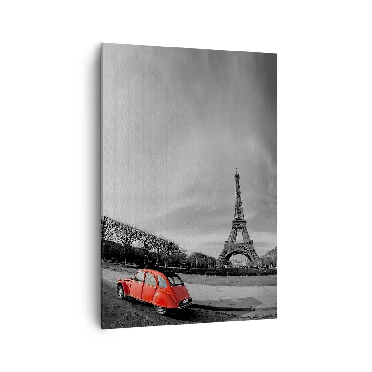 Bild auf Leinwand - Leinwandbild - Ein rotes Auto mit dem Eiffelturm im Hintergrund in einer schwarz-weißen Landschaft - 70x100cm - Pariser als Paris selbst - Moderne Wanddekoration für Wohnzimmer und Schlafzimmer ARTTOR