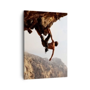 Bild auf Leinwand - Leinwandbild - Ein Kletterer auf einer steilen Klippe in den Bergen im Sonnenschein - 50x70cm - Die Welt ist in einer Hand auf einem Felsblock geschrumpft - Moderne Wanddekoration für Wohnzimmer und Schlafzimmer ARTTOR