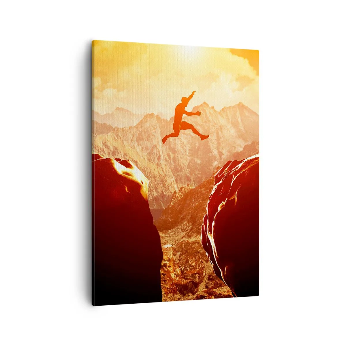 Bild auf Leinwand - Leinwandbild - Eine Figur springt zwischen Felsen mit Bergen im Hintergrund - 50x70cm - Grenzen überschreiten - Moderne Wanddekoration für Wohnzimmer und Schlafzimmer ARTTOR