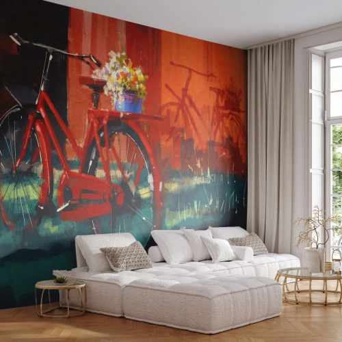 Fototapete Premium Canvas - Ein rotes Fahrrad mit Blumen vor einer orangefarbenen Wand - 100x70cm - Ich möchte mit meinem Fahrrad fahren - Moderne Wanddekoration für Wohnzimmer und Schlafzimmer ARTTOR