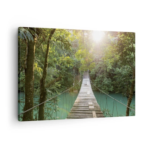 Bild auf Leinwand - Leinwandbild - Eine Hängebrücke in einem tropischen Wald, beleuchtet vom Sonnenlicht. - 70x50cm - Über das azurblaue Wasser zum azurblauen Wald - Moderne Wanddekoration für Wohnzimmer und Schlafzimmer ARTTOR