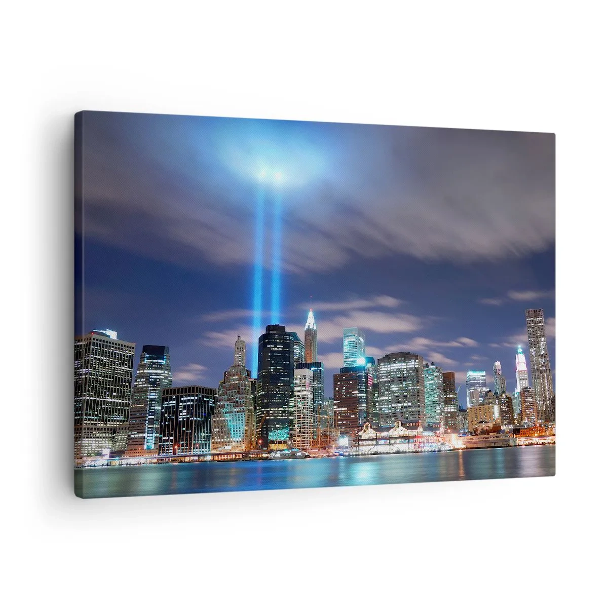Bild auf Leinwand - Leinwandbild - Nachtstadtpanorama mit zwei hellen Lichtstrahlen am Himmel - 70x50cm - Erreiche den Himmel mit dem Licht - Moderne Wanddekoration für Wohnzimmer und Schlafzimmer ARTTOR