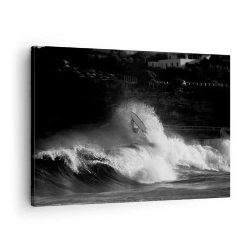 Bild auf Leinwand - Leinwandbild - Ein Surfer, der eine Welle reitet, in Monochrom - 70x50cm - Herausforderung angenommen! - Moderne Wanddekoration für Wohnzimmer und Schlafzimmer ARTTOR
