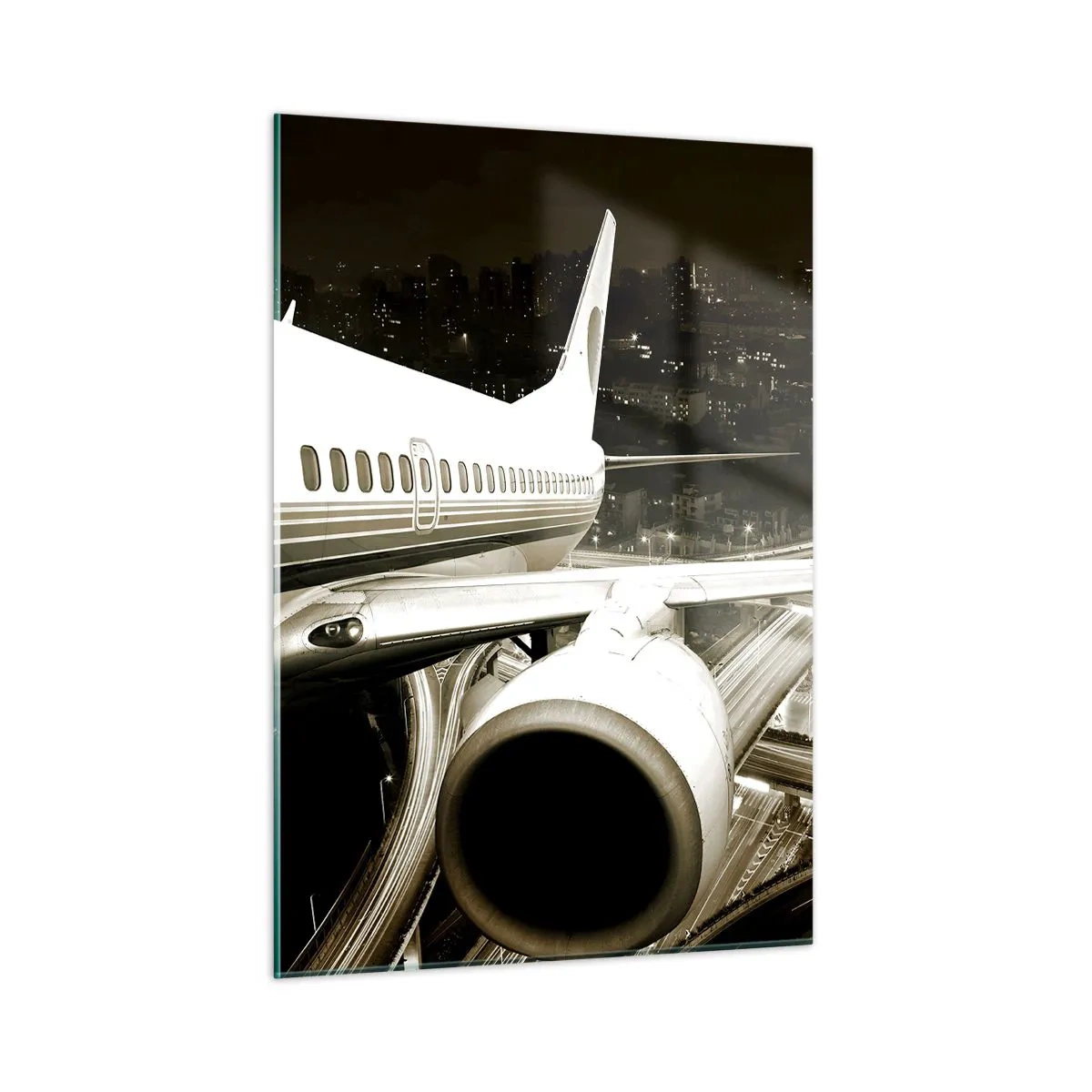 Glasbild - Bild auf glas - Ein Flugzeug über der Stadt bei Nacht mit Industrieatmosphäre - 50x70cm - In die Nacht fliegen - Moderne Wanddekoration für Wohnzimmer und Schlafzimmer ARTTOR