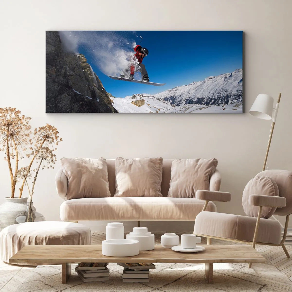 Bild auf Leinwand - Leinwandbild - Ein Snowboarder springt von einem Felsen vor einer Berglandschaft - 160x50cm - Und du wurdest Teil des Raums - Moderne Wanddekoration für Wohnzimmer und Schlafzimmer ARTTOR