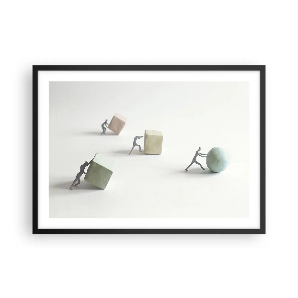 Poster in einem schwarzem Rahmen - Miniaturfiguren, die Formen vor einem hellen Hintergrund schieben - 70x50cm - Pures Leben - Moderne Wanddekoration für Wohnzimmer und Schlafzimmer ARTTOR