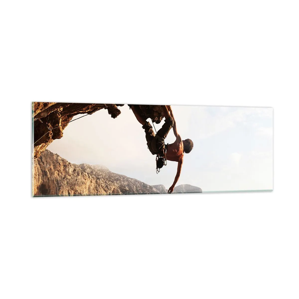 Glasbild - Bild auf glas - Die Welt ist in einer Hand auf einem Felsblock geschrumpft - 90x30 cm