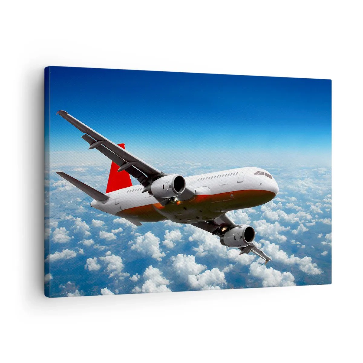 Bild auf Leinwand - Leinwandbild - Ein Passagierflugzeug fliegt über den Wolken vor einem blauen Himmel. - 70x50cm - Entferne dich von allem - Moderne Wanddekoration für Wohnzimmer und Schlafzimmer ARTTOR