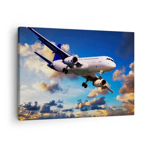 Bild auf Leinwand - Leinwandbild - Ein Passagierflugzeug vor den Wolken bei Sonnenuntergang - 70x50cm - Eine Reise in Weiß und Blau - Moderne Wanddekoration für Wohnzimmer und Schlafzimmer ARTTOR