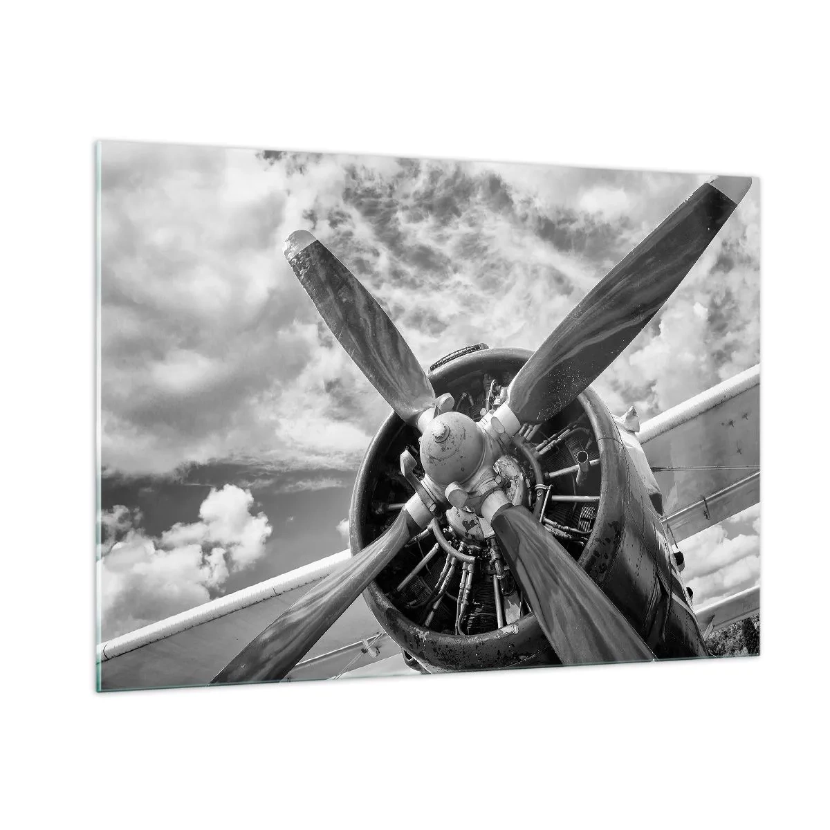 Glasbild - Bild auf glas - Eine Nahaufnahme eines Flugzeugpropellers in Schwarzweiß. - 100x70cm - Eroberer der Lüfte - Moderne Wanddekoration für Wohnzimmer und Schlafzimmer ARTTOR