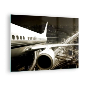 Glasbild - Bild auf glas - Ein Flugzeug über der Stadt bei Nacht mit Industrieatmosphäre - 70x50cm - In die Nacht fliegen - Moderne Wanddekoration für Wohnzimmer und Schlafzimmer ARTTOR