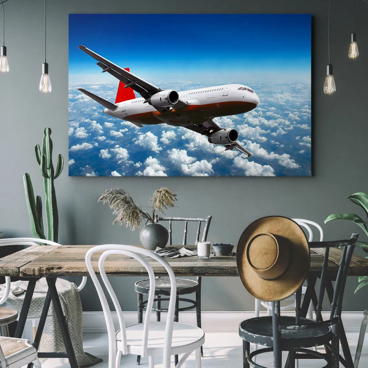 Bild auf Leinwand - Leinwandbild - Ein Passagierflugzeug fliegt über den Wolken vor einem blauen Himmel. - 120x80cm - Entferne dich von allem - Moderne Wanddekoration für Wohnzimmer und Schlafzimmer ARTTOR