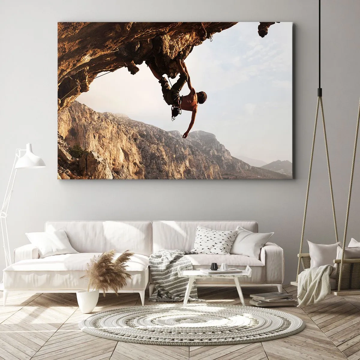 Bild auf Leinwand - Leinwandbild - Ein Kletterer auf einer steilen Klippe in den Bergen im Sonnenschein - 120x80cm - Die Welt ist in einer Hand auf einem Felsblock geschrumpft - Moderne Wanddekoration für Wohnzimmer und Schlafzimmer ARTTOR