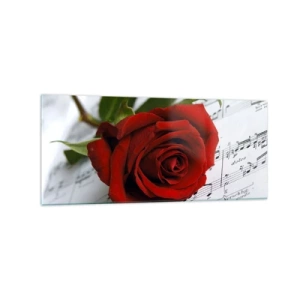 Glasbild - Bild auf glas - Eine rote Rose vor einem Hintergrund aus Musiknoten auf weißem Papier. - 120x50cm - Musik der Gefühle in Scharlach - Moderne Wanddekoration für Wohnzimmer und Schlafzimmer ARTTOR