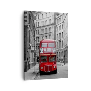 Bild auf Leinwand - Leinwandbild - Ein roter Bus vor einem Hintergrund aus schwarz-weißen Stadtgebäuden. - 50x70cm - Der Alltag muss nicht grau sein - Moderne Wanddekoration für Wohnzimmer und Schlafzimmer ARTTOR