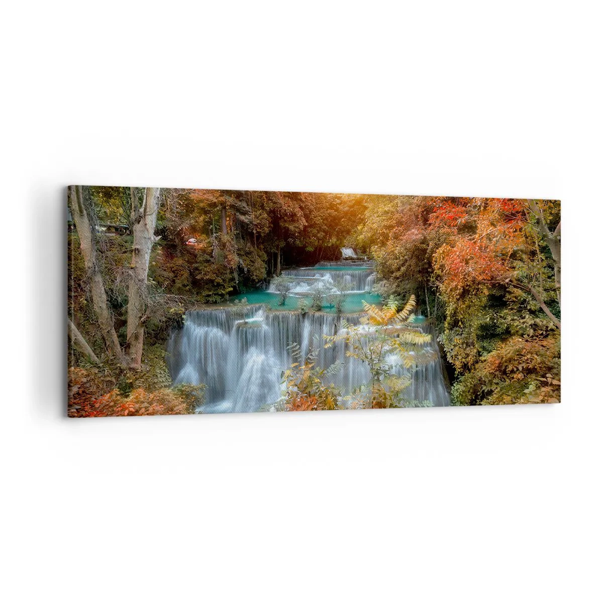 Bild auf Leinwand - Leinwandbild - Herbstlicher Wasserfall, umgeben von bunten Bäumen im Sonnenlicht - 120x50cm - Versteckter Schatz des Waldes - Moderne Wanddekoration für Wohnzimmer und Schlafzimmer ARTTOR