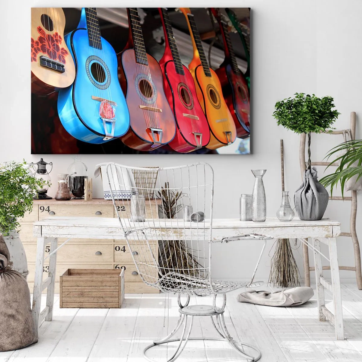 Bild auf Leinwand - Leinwandbild - Bunte Akustikgitarren hängen in einer Reihe auf dem Display - 100x70cm - Lateinische Atmosphäre - Moderne Wanddekoration für Wohnzimmer und Schlafzimmer ARTTOR