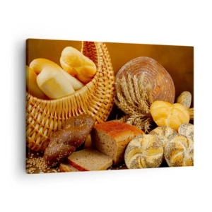 Bild auf Leinwand - Leinwandbild - Verschiedene Brotsorten in einem Weidenkorb auf goldenem Hintergrund - 70x50cm - Wir sind wieder davongekommen - Moderne Wanddekoration für Wohnzimmer und Schlafzimmer ARTTOR