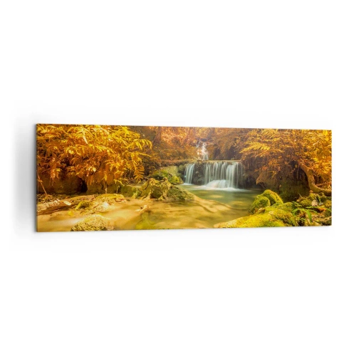 Bild auf Leinwand - Leinwandbild - Ein goldener Wasserfall in einem herbstlichen Wald, umgeben von Grün - 160x50cm - Waldkaskade in Gold - Moderne Wanddekoration für Wohnzimmer und Schlafzimmer ARTTOR