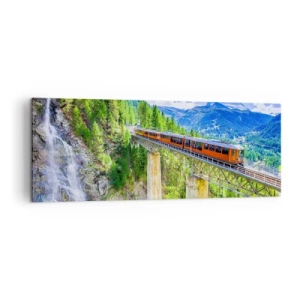Bild auf Leinwand - Leinwandbild - Eine Achterbahn auf einer Brücke mit Blick auf einen Wasserfall und Berge - 140x50cm - Jetzt sind Alpen dran - Moderne Wanddekoration für Wohnzimmer und Schlafzimmer ARTTOR
