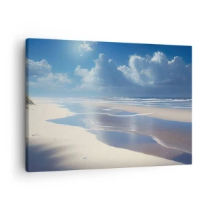 Bild auf Leinwand - Leinwandbild - Ein Sandstrand mit Wellen unter blauem Himmel - 70x50cm - Paradiesischer Urlaub - Moderne Wanddekoration für Wohnzimmer und Schlafzimmer ARTTOR